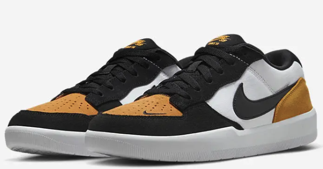 Black white and gold top nike shoes