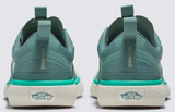 A pair of Vans UltraRange EXO shoes in green color, showcasing the side profile with the lace-up closure and the Vans logo on the heel tab.
