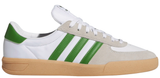 White sneaker with green stripes and tan sole on a white background